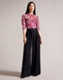 IZABELO-Tops-This is no ordinary top. From frills and mesh to ruched sleeves and a bold print, what more could you possibly want from IZABELO? A true statement piece, this vibrant top will bring new life to your wardrobe. Sit back and let your outfit do the talking. Mesh top Leaf print Ruched 3/4 sleeves Frill details High neck Button fastening Chae is 5'9.5" / 1.77m and wears Bright Pink in a Ted size 1- Ted Baker Romania